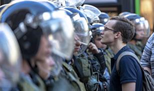 Police confrontation with civilians, as people are trying to get to the protest on Tverskaya Street. Moscow, Russia. 27 July, 2019. Editorial credit: Aleksandr Beliakov / Shutterstock.com
