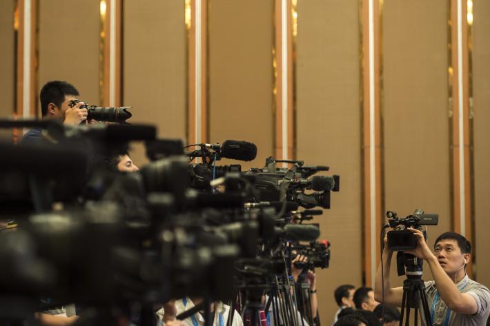BGMI: Chengdu, China — Chinese journalists stand by their video cameras during the G20 High-level Tax Symposium, part of the G20 finance ministers meeting in Chengdu, in China's Sichuan province on July 23, 2016. Chengdu, China — Chinese journalists stand by their video cameras during the G20 High-level Tax Symposium, part of the G20 finance ministers meeting in Chengdu, in China's Sichuan province on July 23, 2016. Photo by Fred Dufour/AFP via Getty Images.