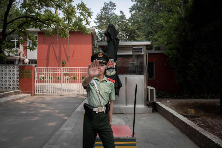BGMI: A police officer outside the Belgium embassy in Beijing on June 19, 2019. Nicolas Asfouri/AFP via Getty Images. Beijing -- A police officer outside the Belgium embassy in Beijing on June 19, 2019. Nicolas Asfouri/AFP via Getty Images.