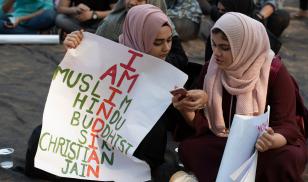Two indian muslim women with poster protests against controversial anti-muslim Citizenship Amendment Bill (CAB CAA). Mumbai, India. 19 December 2019. Editorial credit: arun sambhu mishra / Shutterstock.com