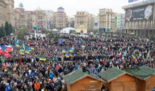 Huge crowd of people gathered on the square, mass demonstration. Revolution of Dignity, Majdan Nezalezhnosti. Kiev, Ukraine. 1 December 2013. Editorial credit: Krysja / Shutterstock.com